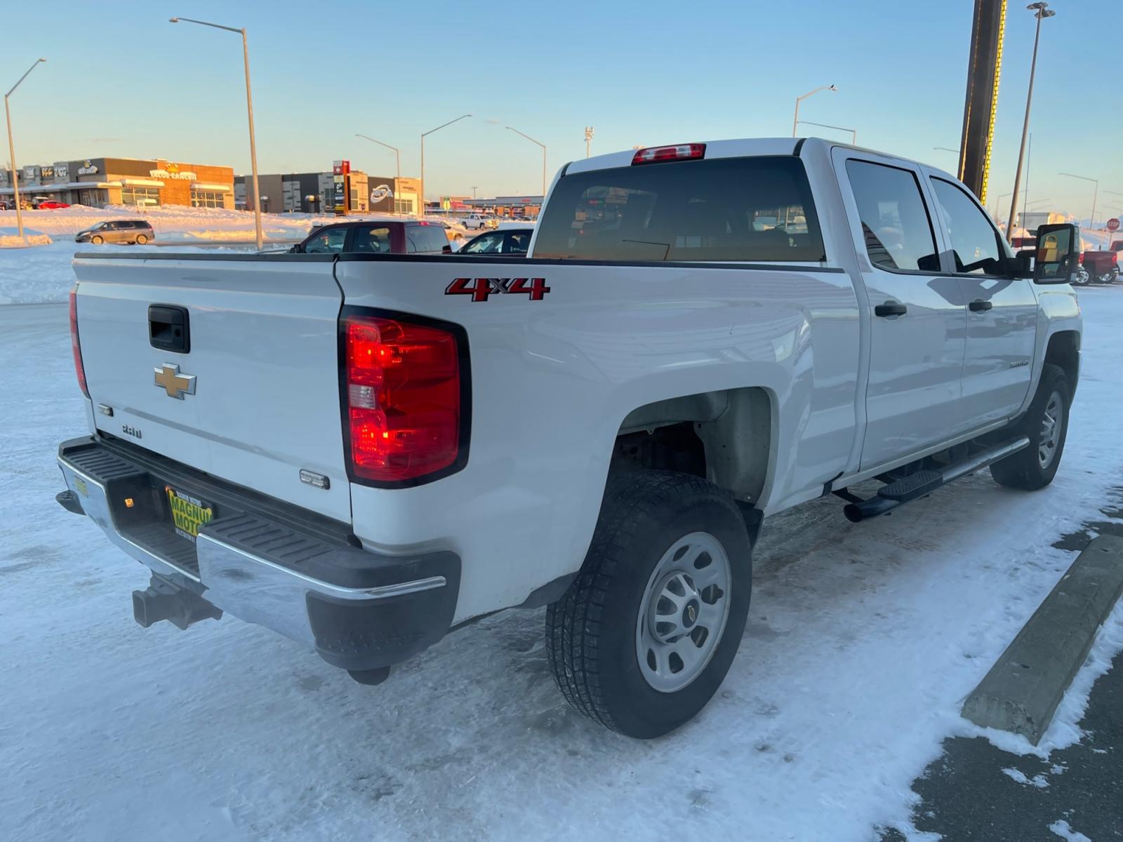 2019 White /Gray Chevrolet Silverado 3500HD Crew Cab 4WD (1GC4KVEY4KF) with an 6.6L V8 OHV 32V TURBO DIESEL engine, 6A transmission, located at 1960 Industrial Drive, Wasilla, 99654, (907) 376-5555, 61.573475, -149.400146 - Photo #4
