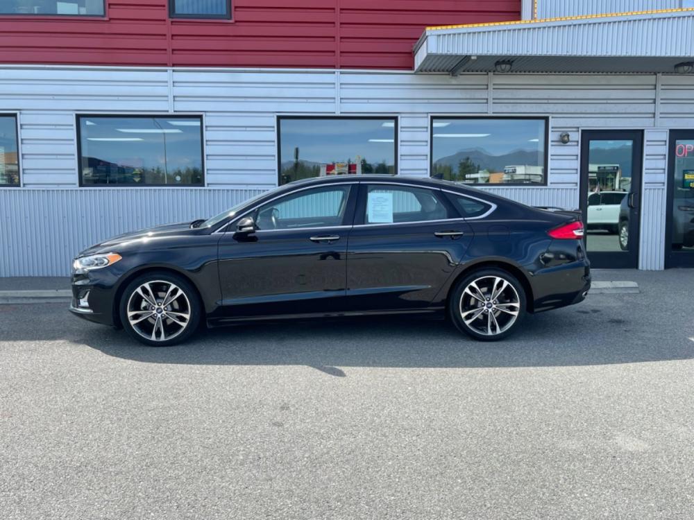 2020 Black /black Ford Fusion Titanium AWD (3FA6P0D94LR) with an 2.0L L4 DOHC 16V engine, 6A transmission, located at 1960 Industrial Drive, Wasilla, 99654, (907) 376-5555, 61.573475, -149.400146 - Photo #1