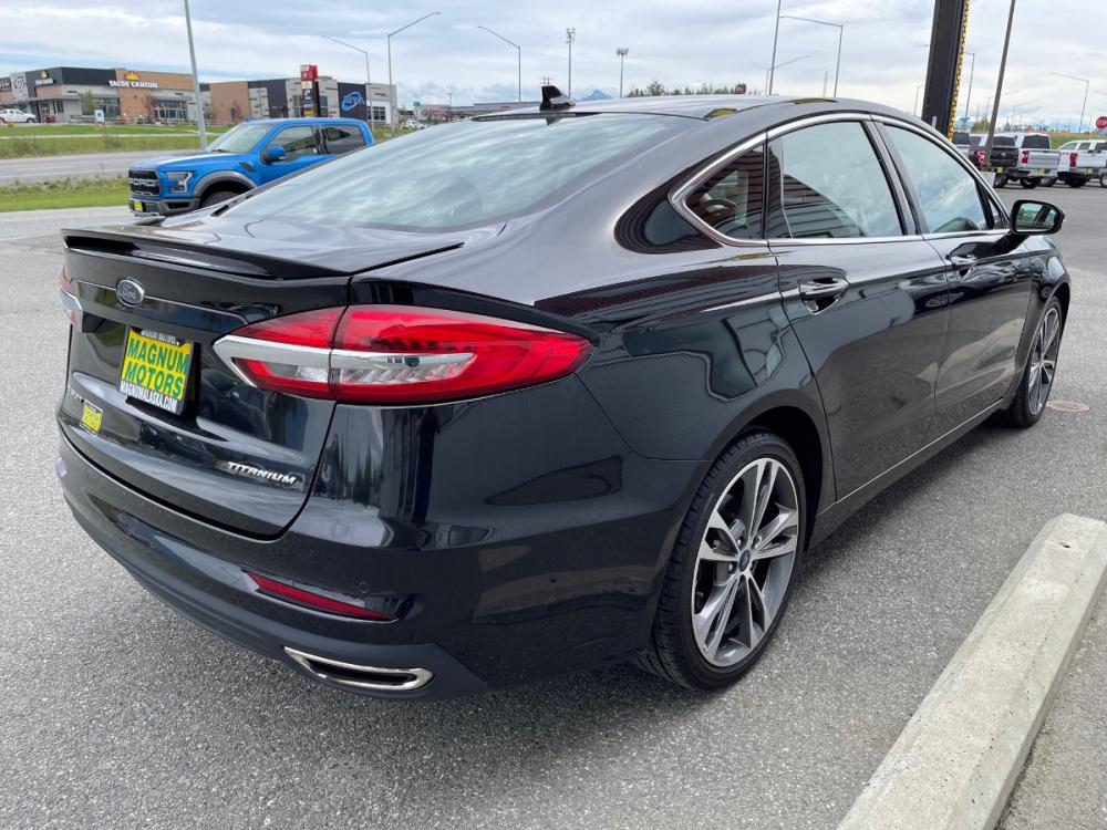 2020 Black /Black Ford Fusion Titanium AWD (3FA6P0D92LR) with an 2.0L L4 DOHC 16V engine, 6A transmission, located at 1960 Industrial Drive, Wasilla, 99654, (907) 376-5555, 61.573475, -149.400146 - Photo #5
