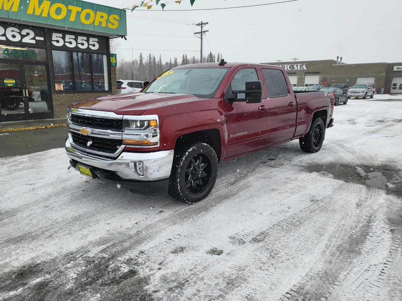 2016 Red /Black Chevrolet Silverado 1500 LT Crew Cab 4WD (3GCUKREC2GG) with an 5.3L V8 OHV 16V engine, 6A transmission, located at 44152 Sterling Highway, Soldotna, 99669, (907) 262-5555, 60.484917, -151.062408 - Photo #1
