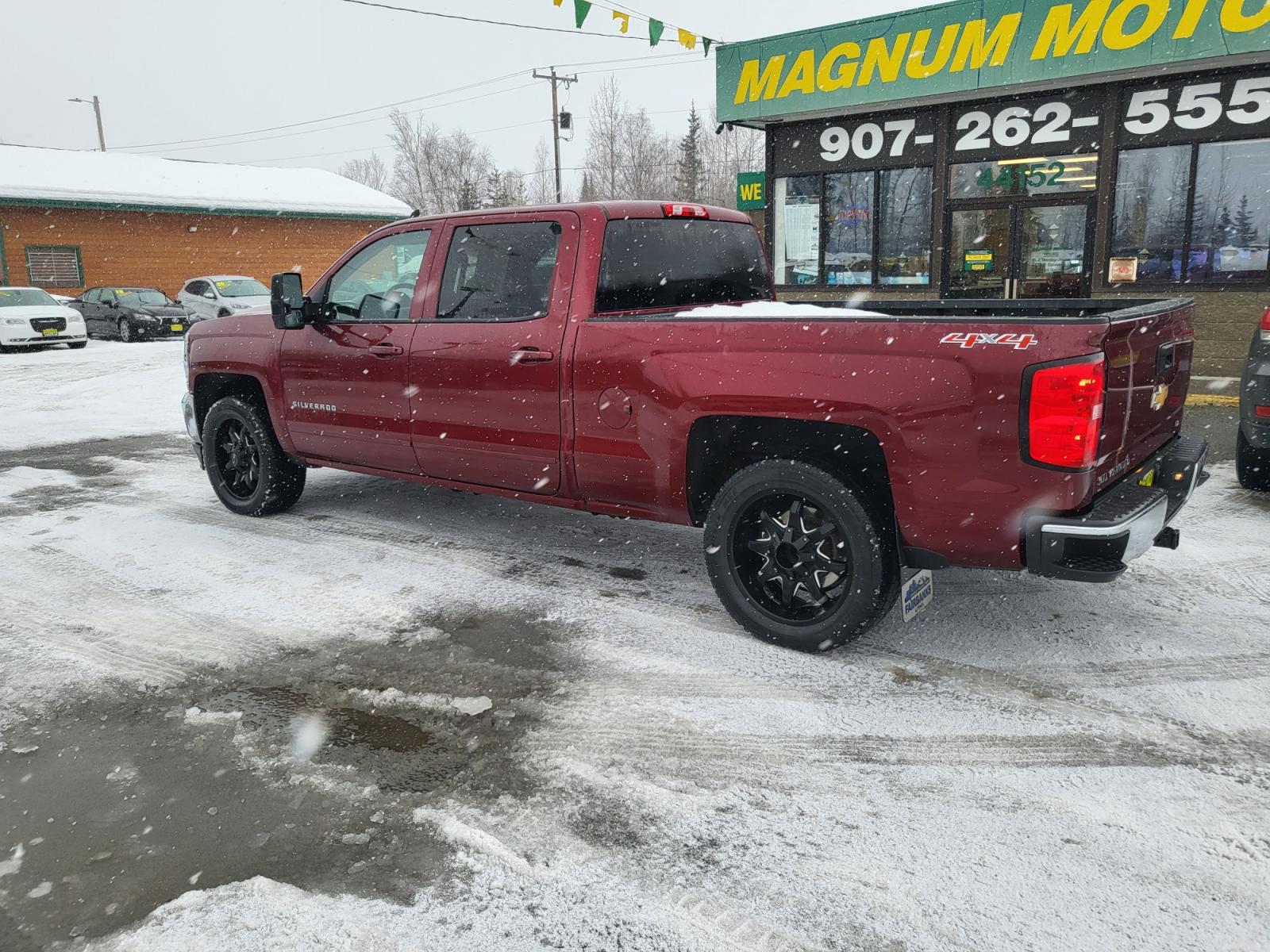 2016 Red /Black Chevrolet Silverado 1500 LT Crew Cab 4WD (3GCUKREC2GG) with an 5.3L V8 OHV 16V engine, 6A transmission, located at 44152 Sterling Highway, Soldotna, 99669, (907) 262-5555, 60.484917, -151.062408 - Photo #3