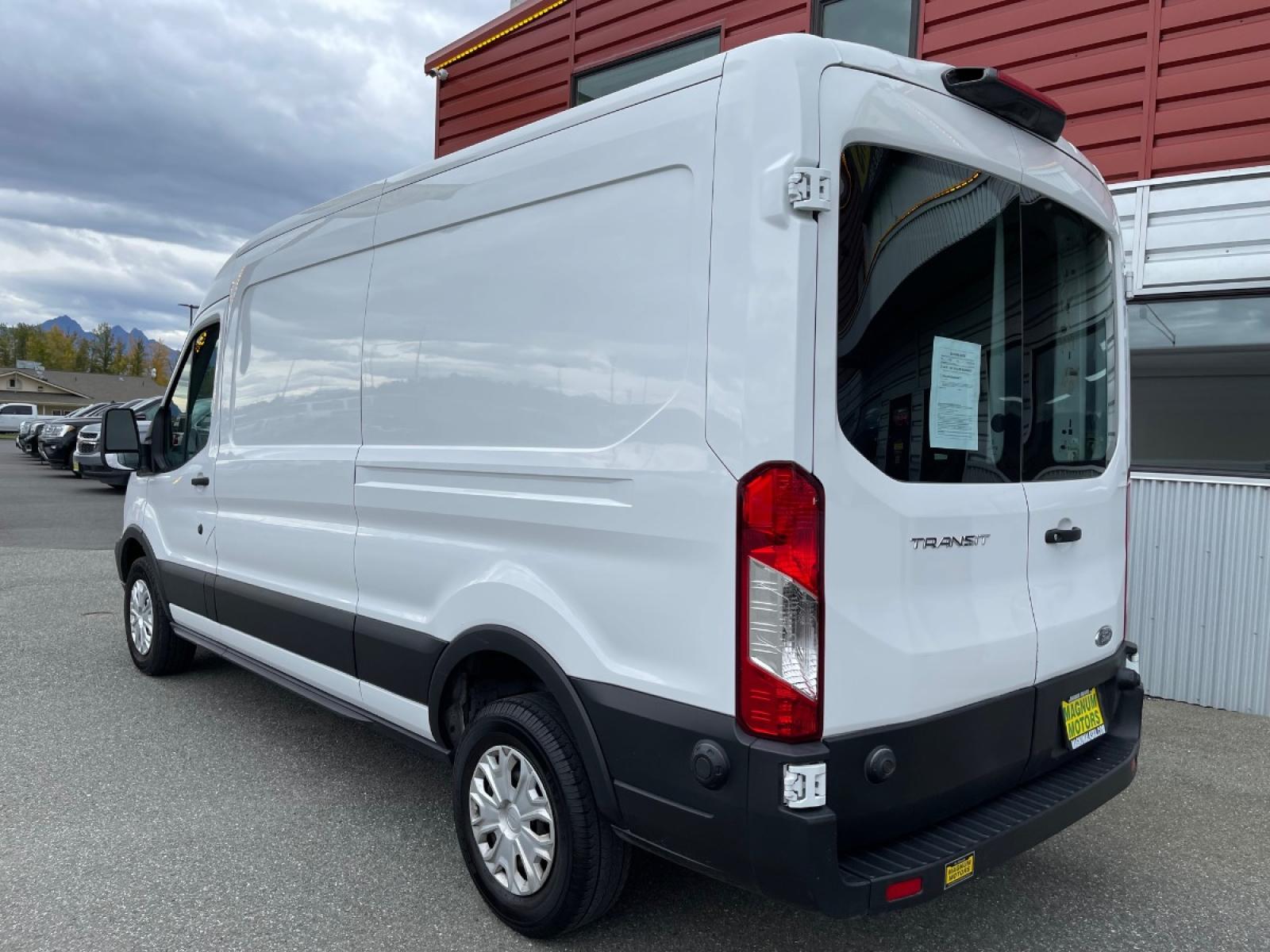 2019 White /Black Ford Transit 250 Van Med. Roof w/Sliding Pass. 148-in. WB (1FTYR2CM2KK) with an 3.7L V6 DOHC 24V engine, 6A transmission, located at 1960 Industrial Drive, Wasilla, 99654, (907) 376-5555, 61.573475, -149.400146 - Photo #2