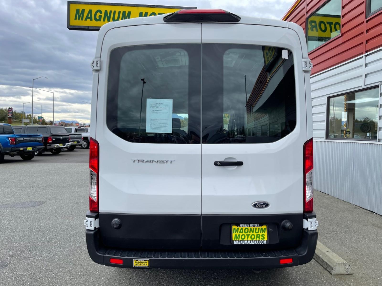 2019 White /Black Ford Transit 250 Van Med. Roof w/Sliding Pass. 148-in. WB (1FTYR2CM2KK) with an 3.7L V6 DOHC 24V engine, 6A transmission, located at 1960 Industrial Drive, Wasilla, 99654, (907) 376-5555, 61.573475, -149.400146 - Photo #3