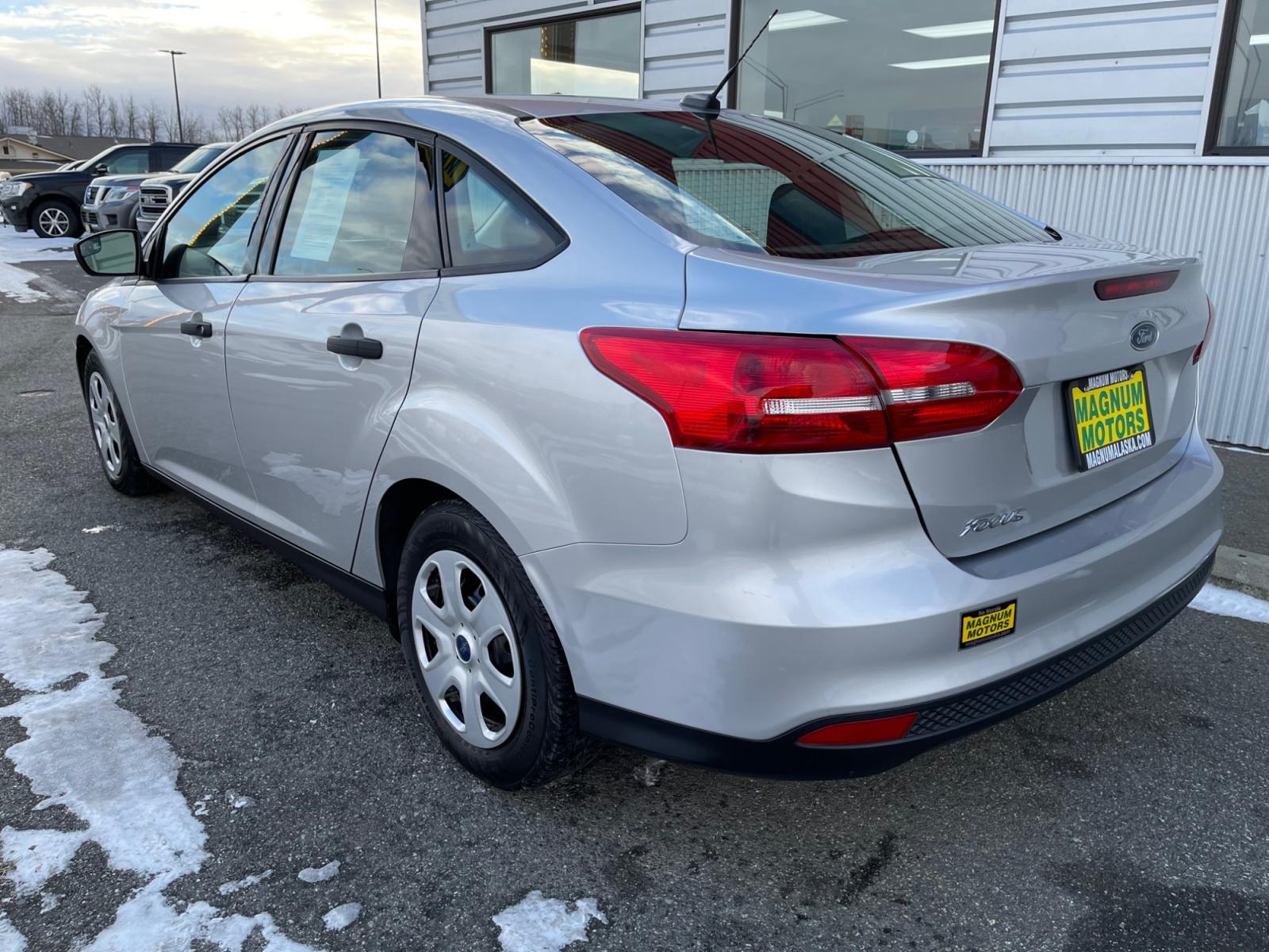 2017 Silver /Black Ford Focus S Sedan (1FADP3E26HL) with an 2.0L L4 DOHC 16V engine, 5-speed Manual transmission, located at 1960 Industrial Drive, Wasilla, 99654, (907) 376-5555, 61.573475, -149.400146 - Photo #3