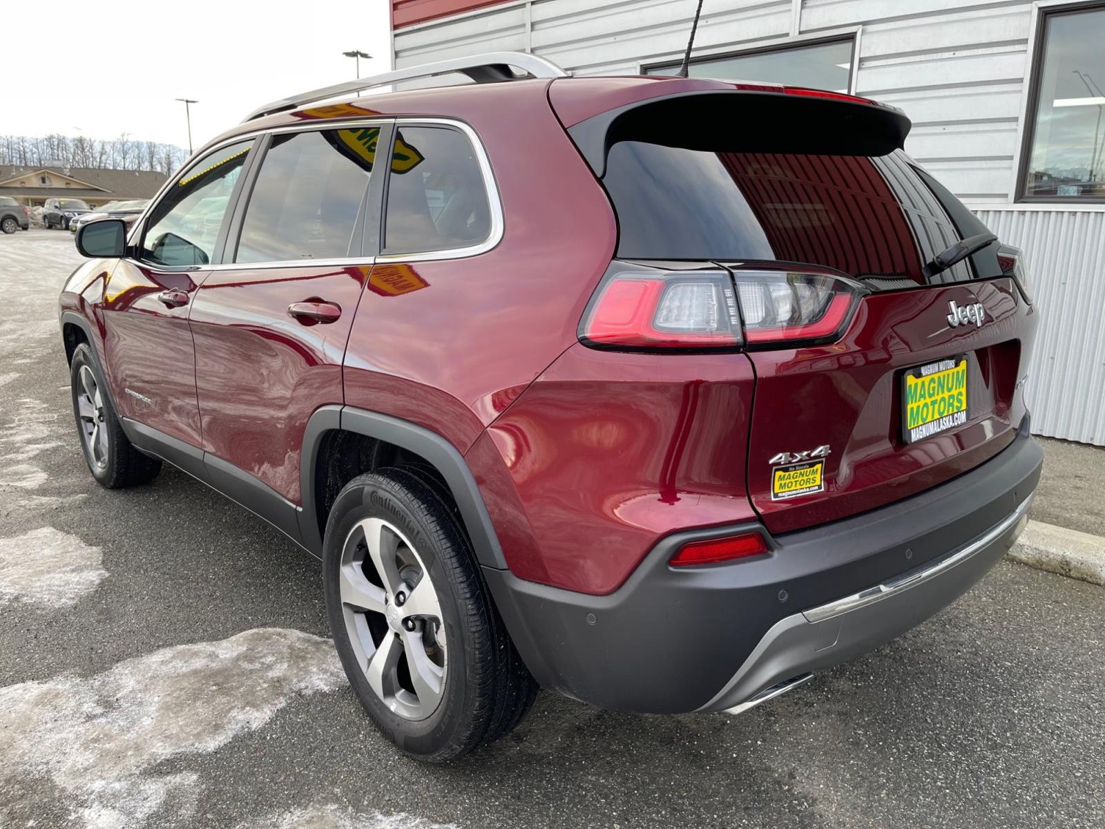 2021 Red /Black Jeep Cherokee Limited 4WD (1C4PJMDX7MD) with an 3.2L V6 DOHC 24V engine, 9A transmission, located at 1960 Industrial Drive, Wasilla, 99654, (907) 376-5555, 61.573475, -149.400146 - Photo #3