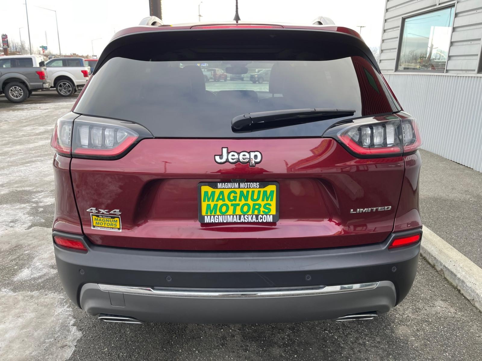 2021 Red /Black Jeep Cherokee Limited 4WD (1C4PJMDX7MD) with an 3.2L V6 DOHC 24V engine, 9A transmission, located at 1960 Industrial Drive, Wasilla, 99654, (907) 376-5555, 61.573475, -149.400146 - Photo #4
