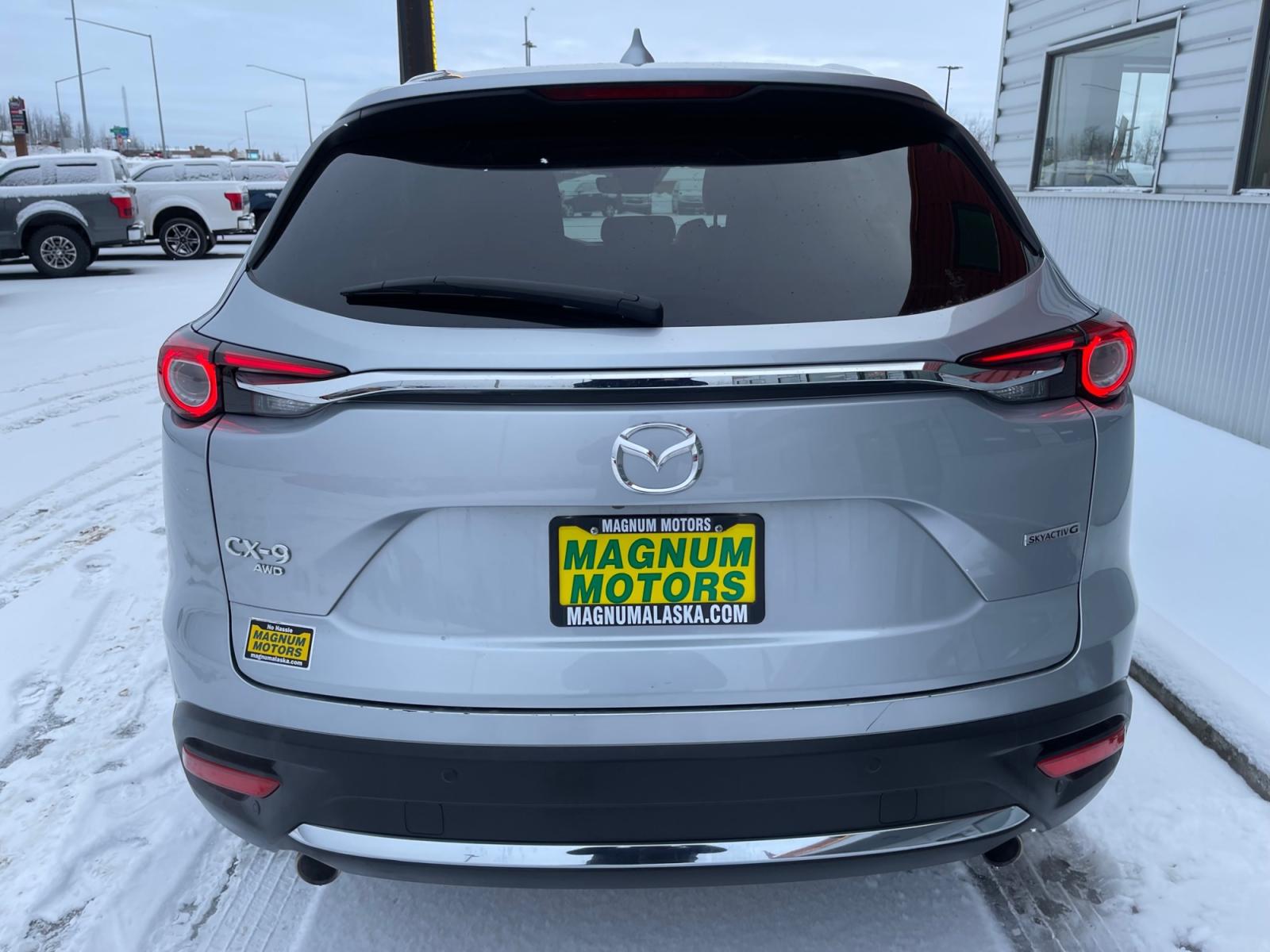 2021 Silver /Black Mazda CX-9 Grand Touring AWD (JM3TCBDY5M0) with an 2.5L L4 DOHC 16V engine, 6A transmission, located at 1960 Industrial Drive, Wasilla, 99654, (907) 376-5555, 61.573475, -149.400146 - Photo #4