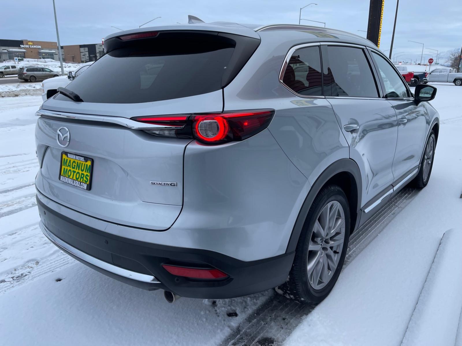 2021 Silver /Black Mazda CX-9 Grand Touring AWD (JM3TCBDY5M0) with an 2.5L L4 DOHC 16V engine, 6A transmission, located at 1960 Industrial Drive, Wasilla, 99654, (907) 376-5555, 61.573475, -149.400146 - Photo #5