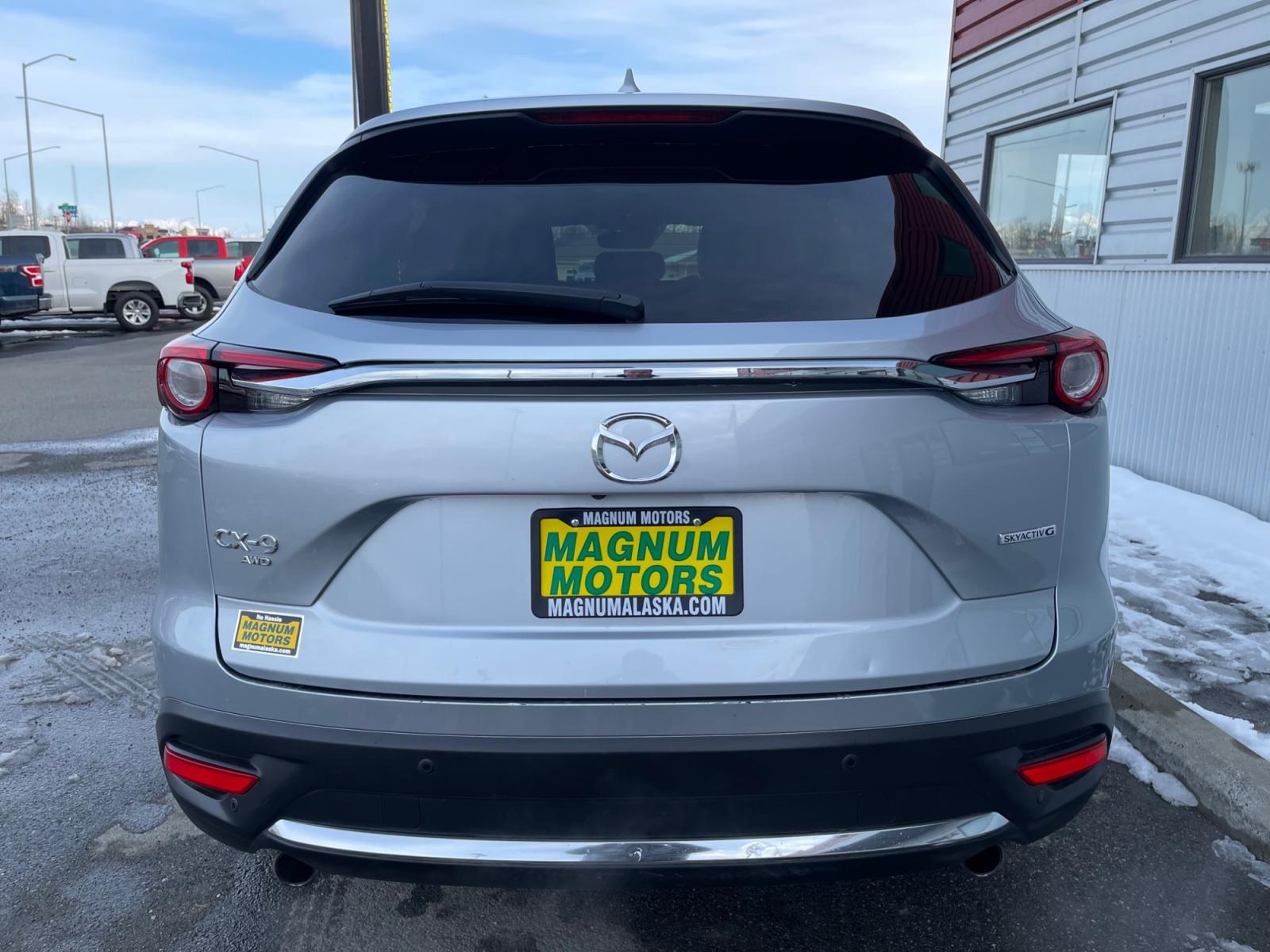 2021 Silver /Black Mazda CX-9 Grand Touring AWD (JM3TCBDY9M0) with an 2.5L L4 DOHC 16V engine, 6A transmission, located at 1960 Industrial Drive, Wasilla, 99654, (907) 376-5555, 61.573475, -149.400146 - Photo #4