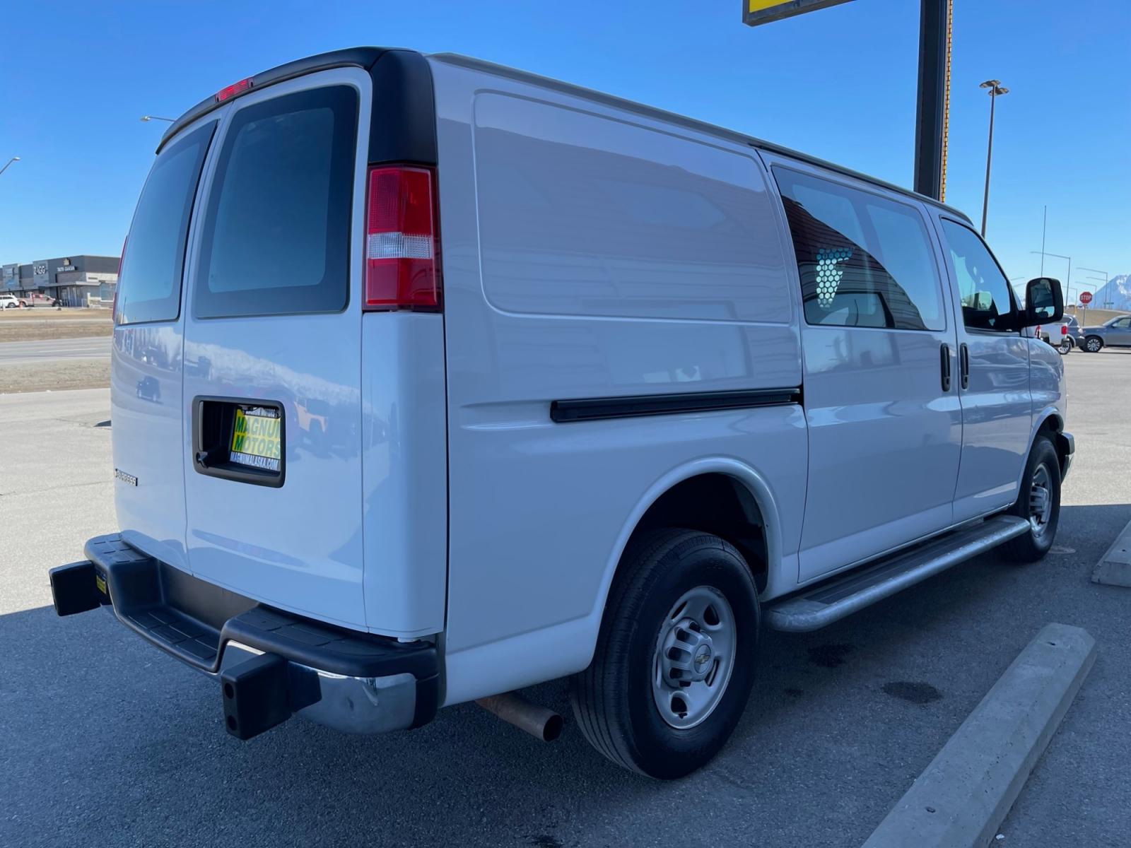 2020 White /Gray Chevrolet Express 2500 Cargo (1GCWGAFG9L1) with an 6.0L V8 OHV 16V FFV engine, 6A transmission, located at 1960 Industrial Drive, Wasilla, 99654, (907) 376-5555, 61.573475, -149.400146 - Photo #4