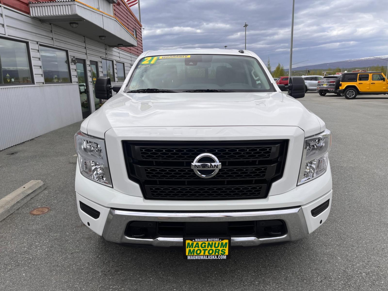 2021 White Nissan Titan SV Crew Cab 4WD (1N6AA1ED9MN) with an 5.6L V8 DOHC 32V engine, 9A transmission, located at 1960 Industrial Drive, Wasilla, 99654, (907) 376-5555, 61.573475, -149.400146 - Photo #6