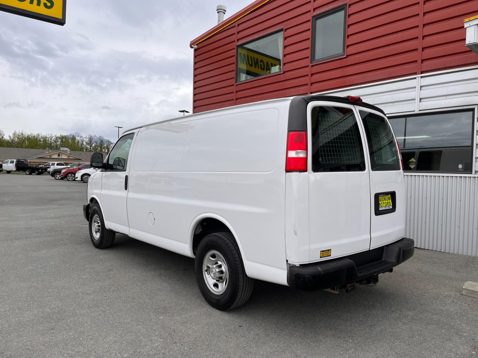 2015 Chevrolet Express 2500 Cargo FFV (1GCWGFCFXF1) with an 4.8L V8 FFV engine, 6-Speed Automatic transmission, located at 1960 Industrial Drive, Wasilla, 99654, (907) 376-5555, 61.573475, -149.400146 - Photo #2