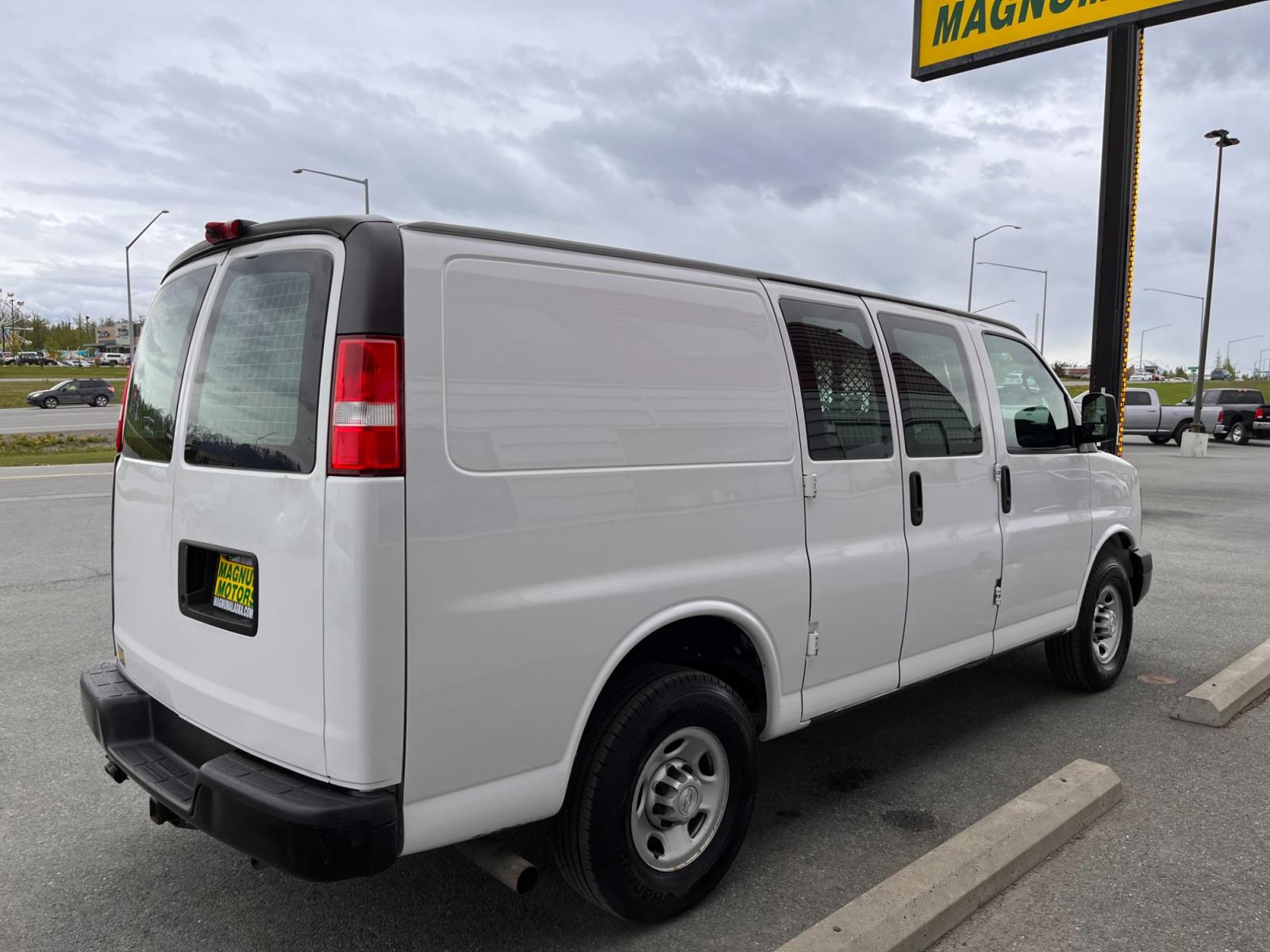 2015 Chevrolet Express 2500 Cargo FFV (1GCWGFCFXF1) with an 4.8L V8 FFV engine, 6-Speed Automatic transmission, located at 1960 Industrial Drive, Wasilla, 99654, (907) 376-5555, 61.573475, -149.400146 - Photo #4