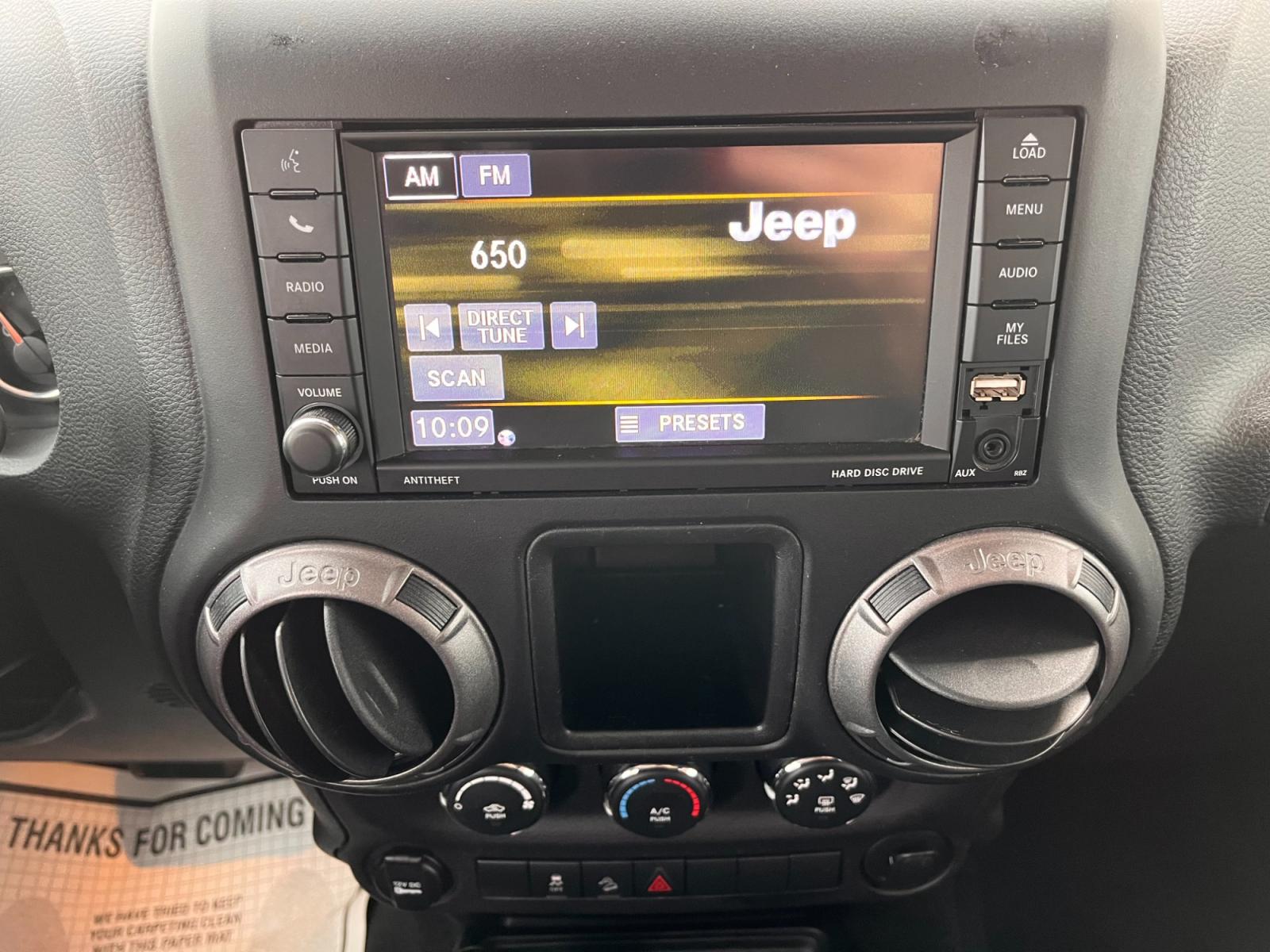 2018 Red Jeep Wrangler Unlimited Sport 4WD (1C4BJWDG2JL) with an 3.6L V6 DOHC 24V FFV engine, located at 44152 Sterling Highway, Soldotna, 99669, (907) 262-5555, 60.484917, -151.062408 - Photo #15