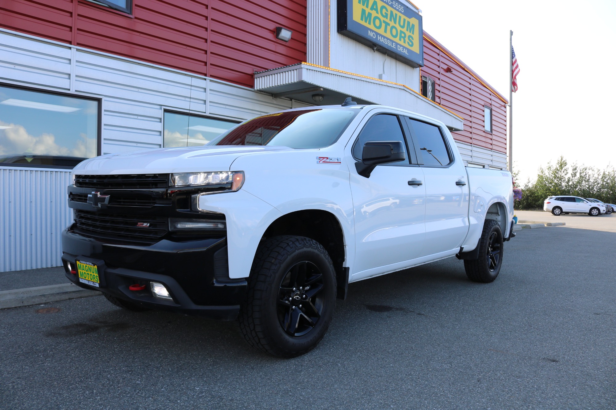 photo of 2021 Chevrolet Silverado 1500 LT Trail Boss Crew Cab 4WD