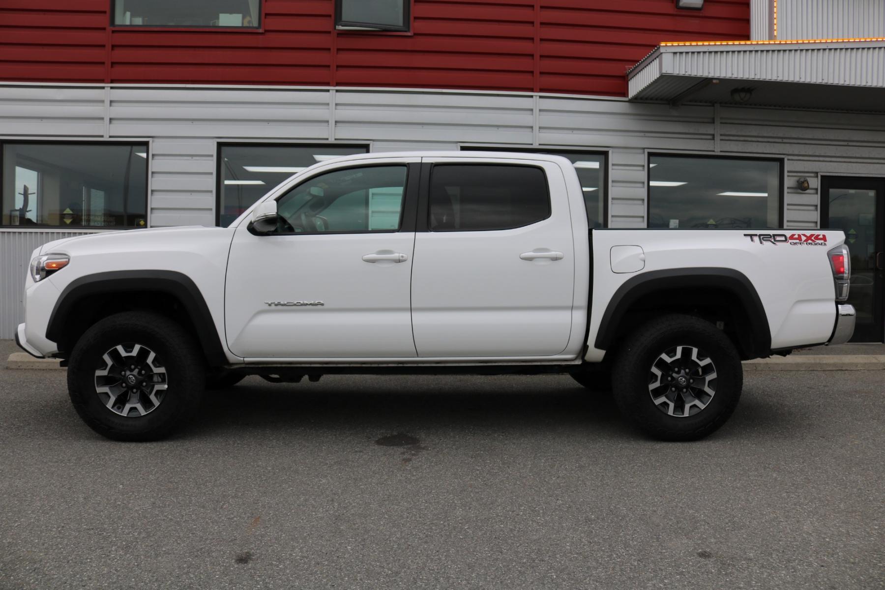 2022 White /Black Toyota Tacoma TRD OFF ROAD V6 6AT 4WD (3TMCZ5AN9NM) with an 3.5L V6 DOHC 24V engine, 6A transmission, located at 1960 Industrial Drive, Wasilla, 99654, (907) 376-5555, 61.573475, -149.400146 - Photo #2