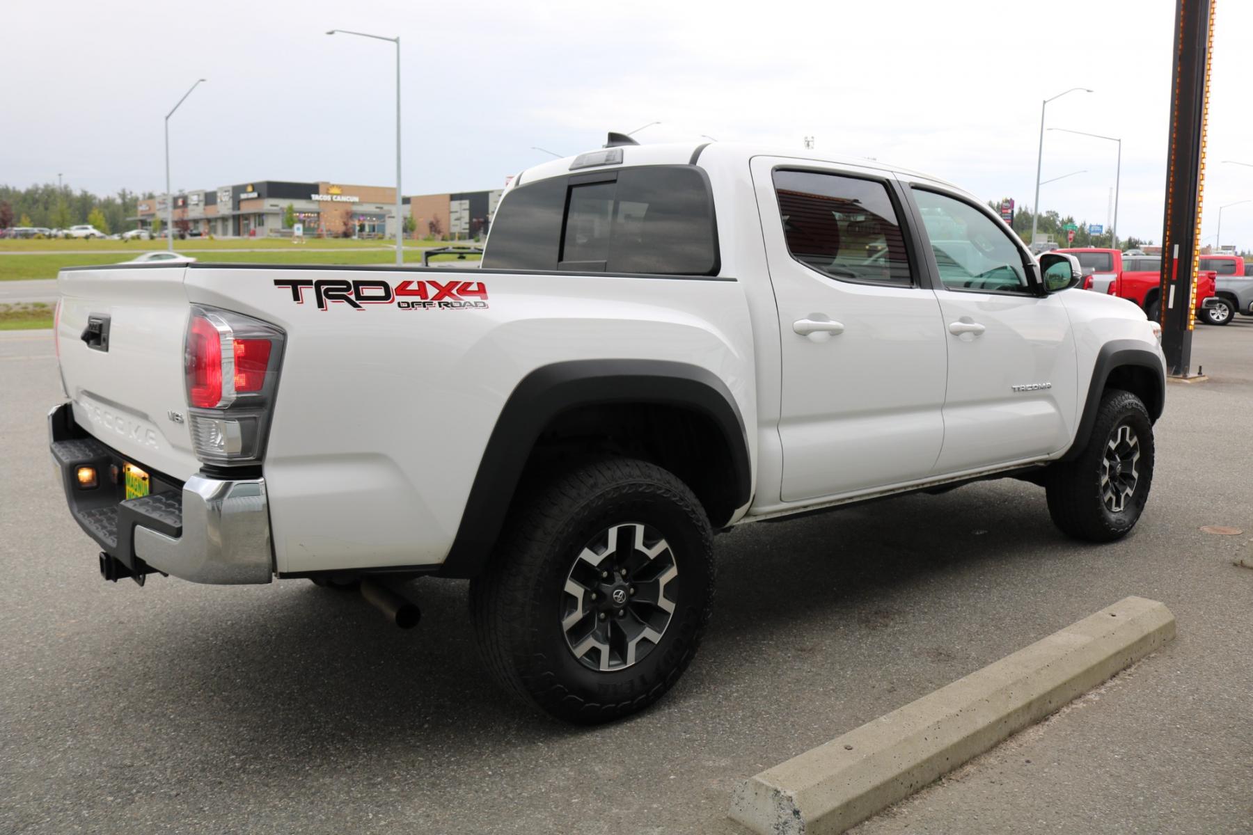 2022 White /Black Toyota Tacoma TRD OFF ROAD V6 6AT 4WD (3TMCZ5AN9NM) with an 3.5L V6 DOHC 24V engine, 6A transmission, located at 1960 Industrial Drive, Wasilla, 99654, (907) 376-5555, 61.573475, -149.400146 - Photo #5