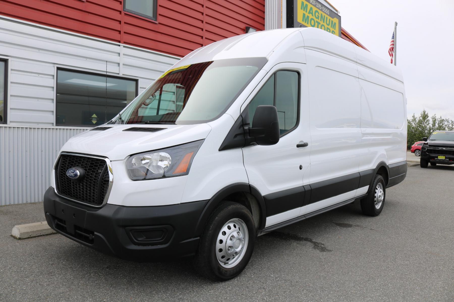 2023 White /Black Ford Transit 250 Van High Roof w/Sliding Pass. 148-in. WB EL (1FTBR3U82PK) with an 3.5L V6 DOHC 24V engine, 6A transmission, located at 1960 Industrial Drive, Wasilla, 99654, (907) 376-5555, 61.573475, -149.400146 - Extended - Photo #0