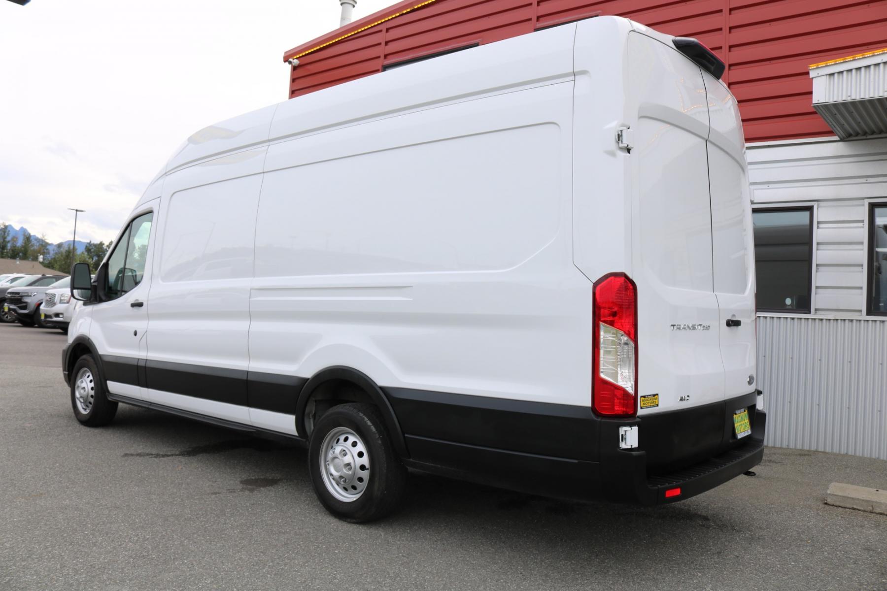 2023 White /Black Ford Transit 250 Van High Roof w/Sliding Pass. 148-in. WB EL (1FTBR3U82PK) with an 3.5L V6 DOHC 24V engine, 6A transmission, located at 1960 Industrial Drive, Wasilla, 99654, (907) 376-5555, 61.573475, -149.400146 - Extended - Photo #3