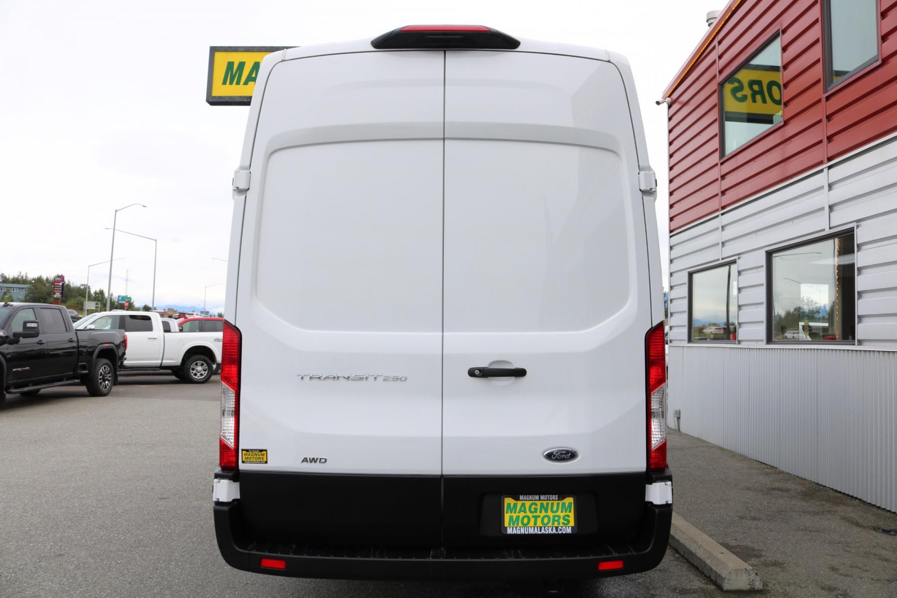 2023 White /Black Ford Transit 250 Van High Roof w/Sliding Pass. 148-in. WB EL (1FTBR3U82PK) with an 3.5L V6 DOHC 24V engine, 6A transmission, located at 1960 Industrial Drive, Wasilla, 99654, (907) 376-5555, 61.573475, -149.400146 - Extended - Photo #4
