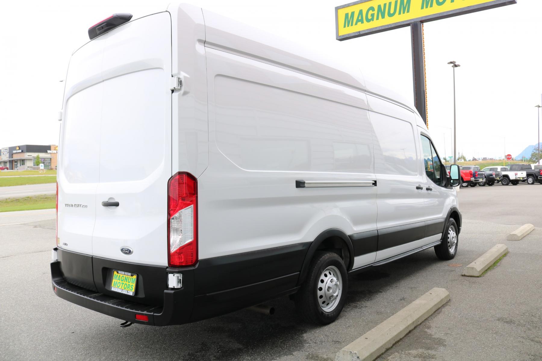 2023 White /Black Ford Transit 250 Van High Roof w/Sliding Pass. 148-in. WB EL (1FTBR3U82PK) with an 3.5L V6 DOHC 24V engine, 6A transmission, located at 1960 Industrial Drive, Wasilla, 99654, (907) 376-5555, 61.573475, -149.400146 - Extended - Photo #5