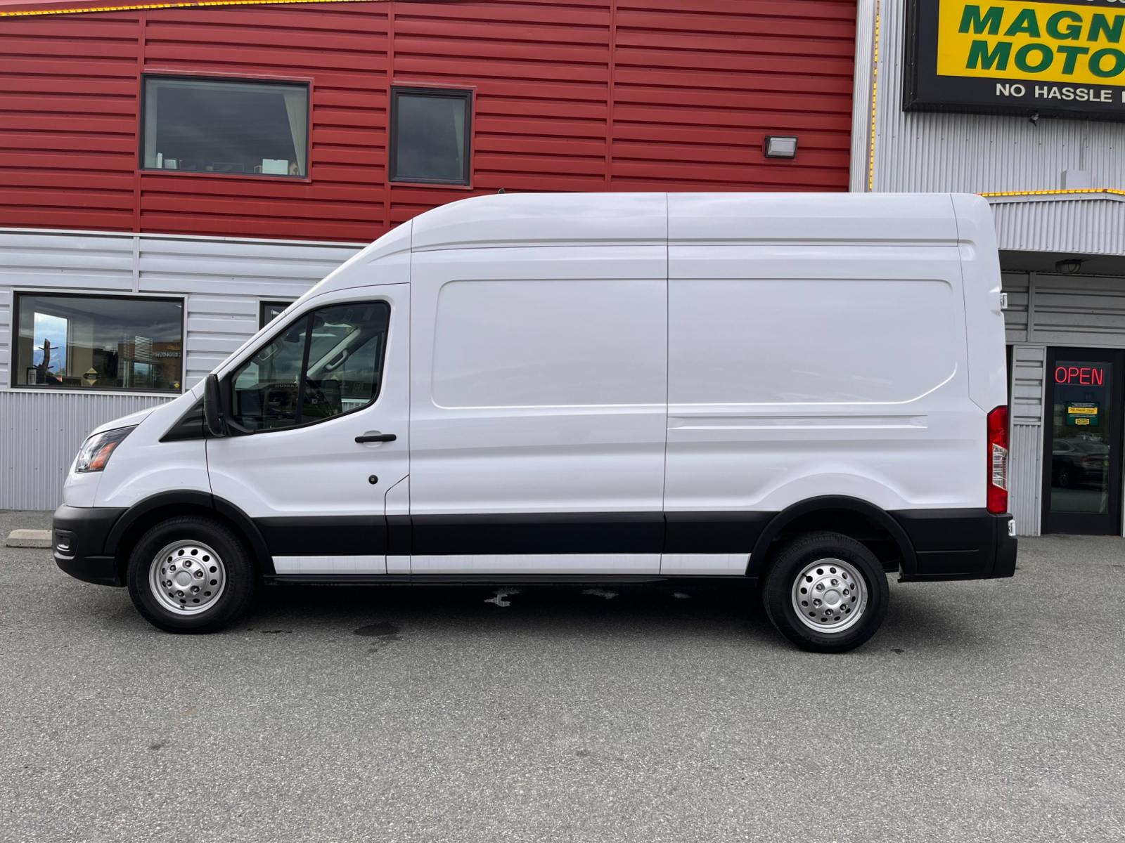 2022 White /Black Ford Transit 250 Van High Roof w/Sliding Pass. 148-in. WB (1FTBR2X80NK) with an 3.5L V6 DOHC 24V engine, 6A transmission, located at 1960 Industrial Drive, Wasilla, 99654, (907) 376-5555, 61.573475, -149.400146 - AWD - Photo #1