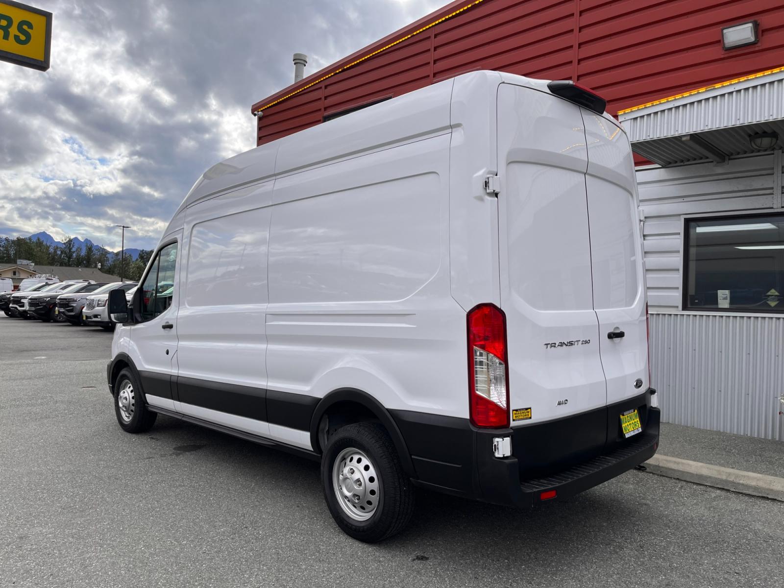 2022 White /Black Ford Transit 250 Van High Roof w/Sliding Pass. 148-in. WB (1FTBR2X80NK) with an 3.5L V6 DOHC 24V engine, 6A transmission, located at 1960 Industrial Drive, Wasilla, 99654, (907) 376-5555, 61.573475, -149.400146 - AWD - Photo #2