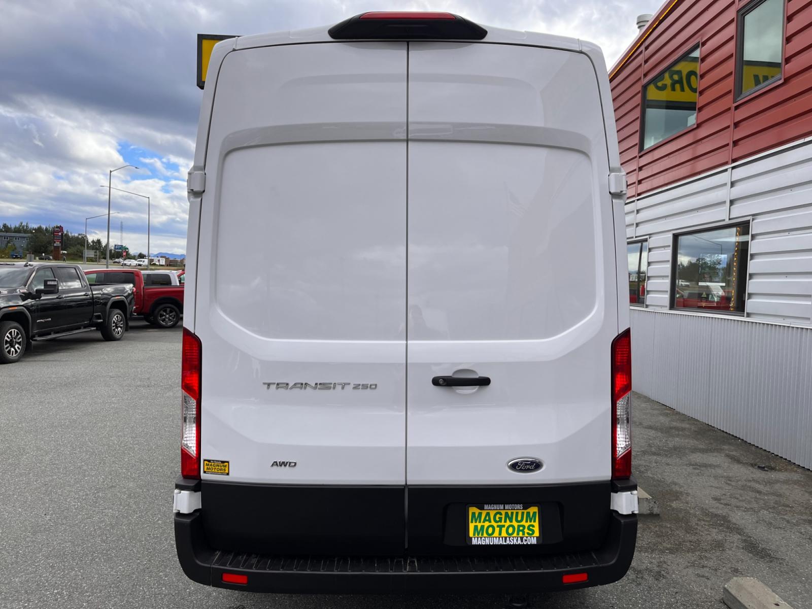 2022 White /Black Ford Transit 250 Van High Roof w/Sliding Pass. 148-in. WB (1FTBR2X80NK) with an 3.5L V6 DOHC 24V engine, 6A transmission, located at 1960 Industrial Drive, Wasilla, 99654, (907) 376-5555, 61.573475, -149.400146 - AWD - Photo #3