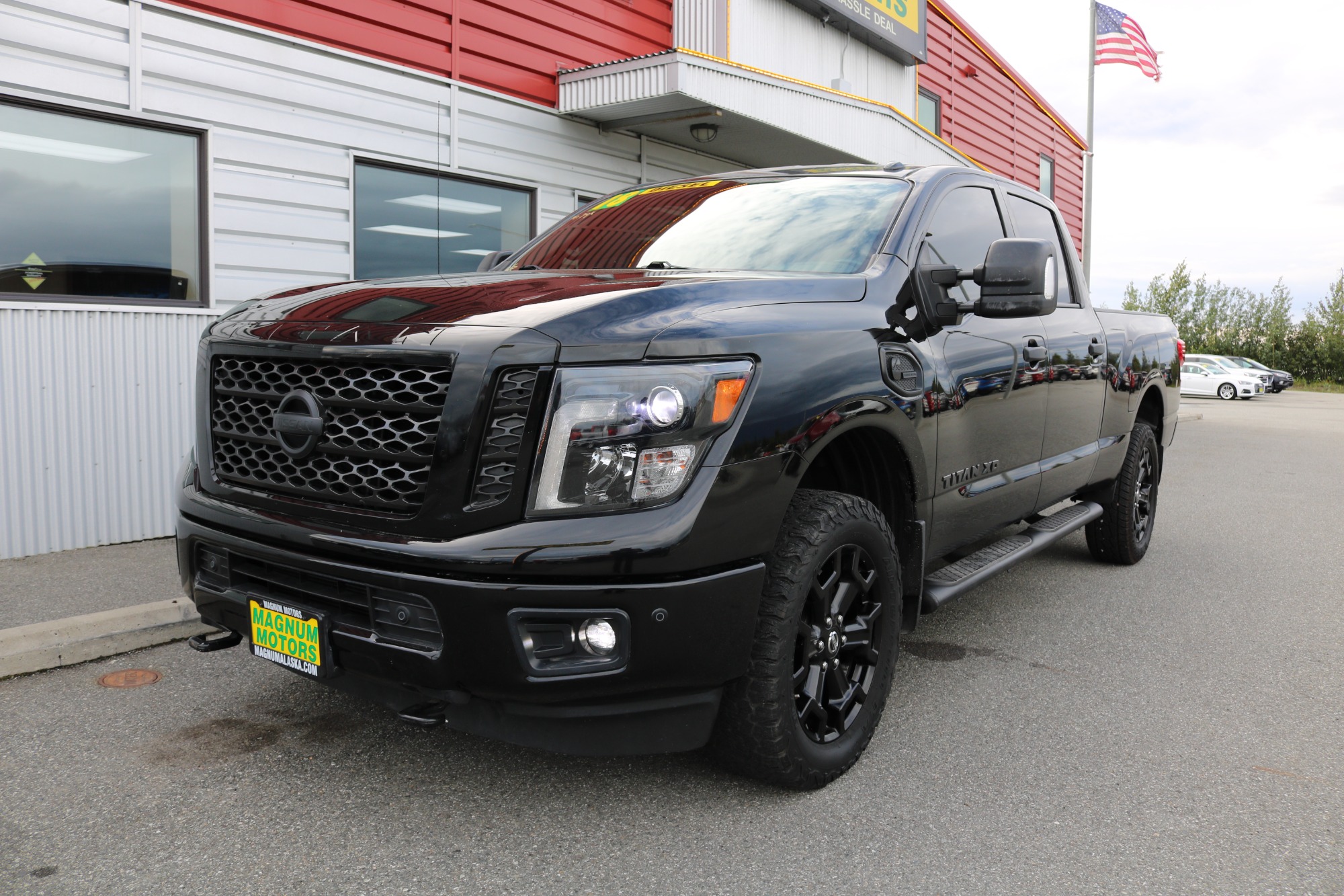 photo of 2018 Nissan Titan XD Platinum Reserve 4WD W/ A 5.0L CUMMINS DIESEL!!