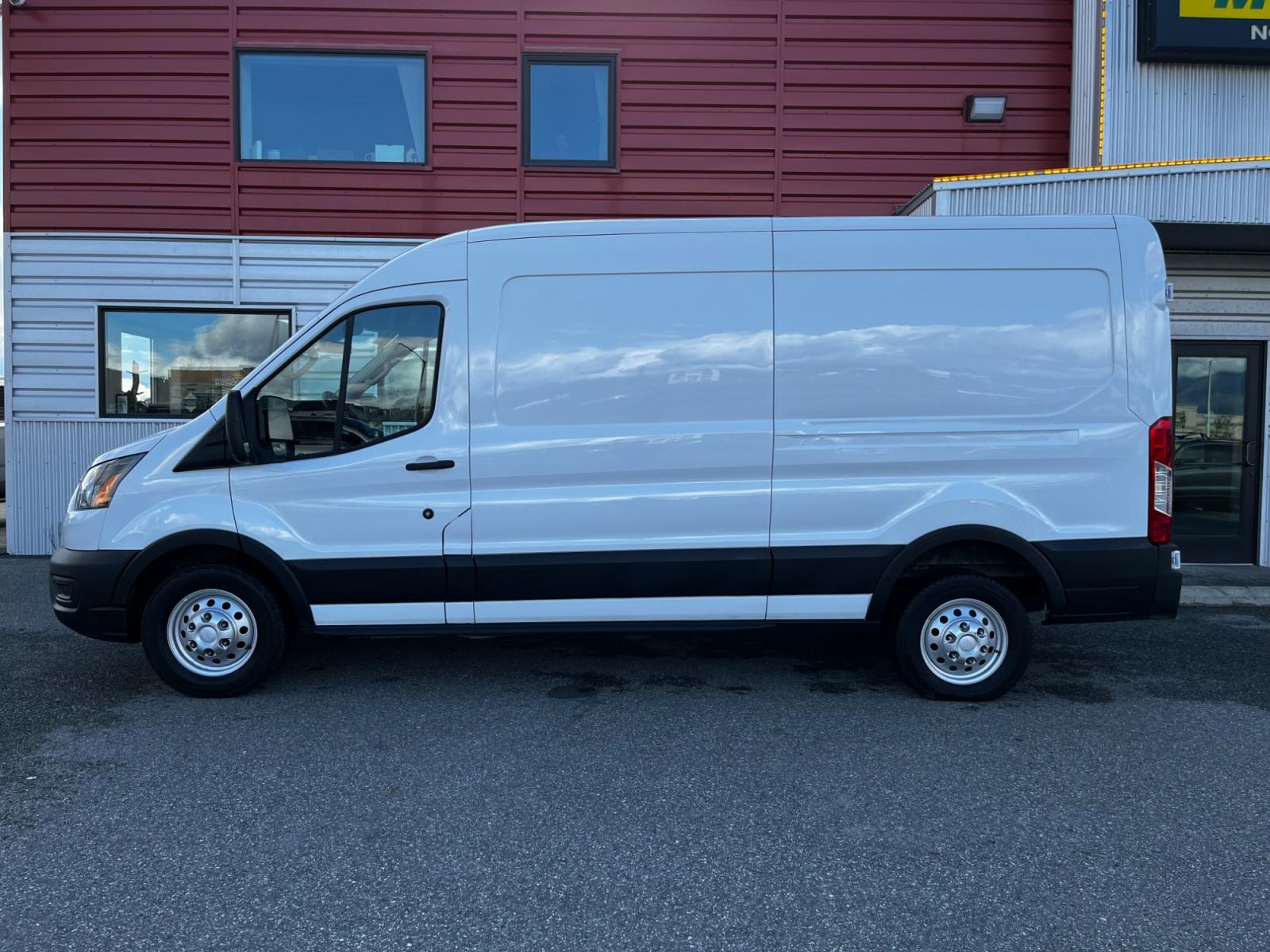 2021 White /Black Ford Transit 250 Van Med. Roof w/Sliding Pass. 148-in. WB (1FTBR2C84MK) with an 3.5L V6 DOHC 24V engine, 6A transmission, located at 1960 Industrial Drive, Wasilla, 99654, (907) 376-5555, 61.573475, -149.400146 - Photo #1