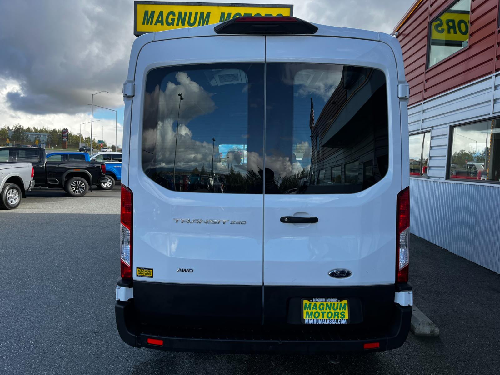 2021 White /Black Ford Transit 250 Van Med. Roof w/Sliding Pass. 148-in. WB (1FTBR2C84MK) with an 3.5L V6 DOHC 24V engine, 6A transmission, located at 1960 Industrial Drive, Wasilla, 99654, (907) 376-5555, 61.573475, -149.400146 - Photo #3