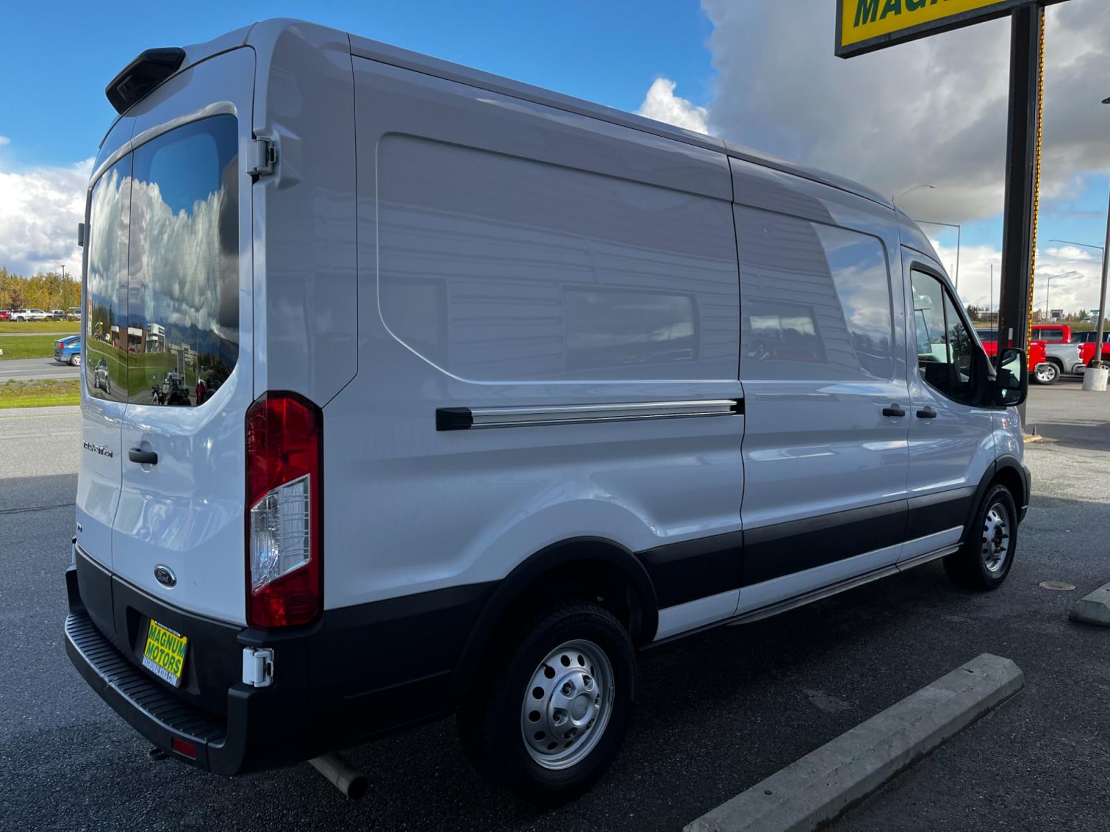2021 White /Black Ford Transit 250 Van Med. Roof w/Sliding Pass. 148-in. WB (1FTBR2C84MK) with an 3.5L V6 DOHC 24V engine, 6A transmission, located at 1960 Industrial Drive, Wasilla, 99654, (907) 376-5555, 61.573475, -149.400146 - Photo #4