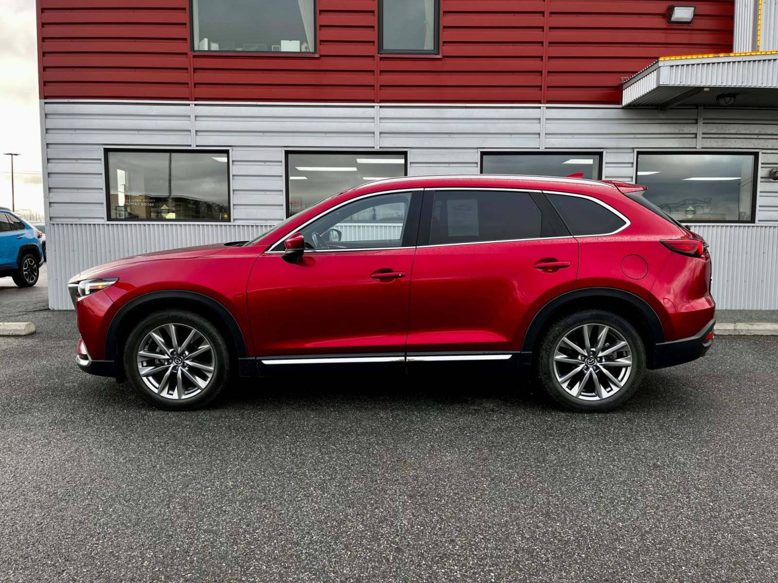 2021 Red /Black Mazda CX-9 Grand Touring AWD (JM3TCBDY7M0) with an 2.5L L4 DOHC 16V engine, 6A transmission, located at 1960 Industrial Drive, Wasilla, 99654, (907) 376-5555, 61.573475, -149.400146 - Photo #2