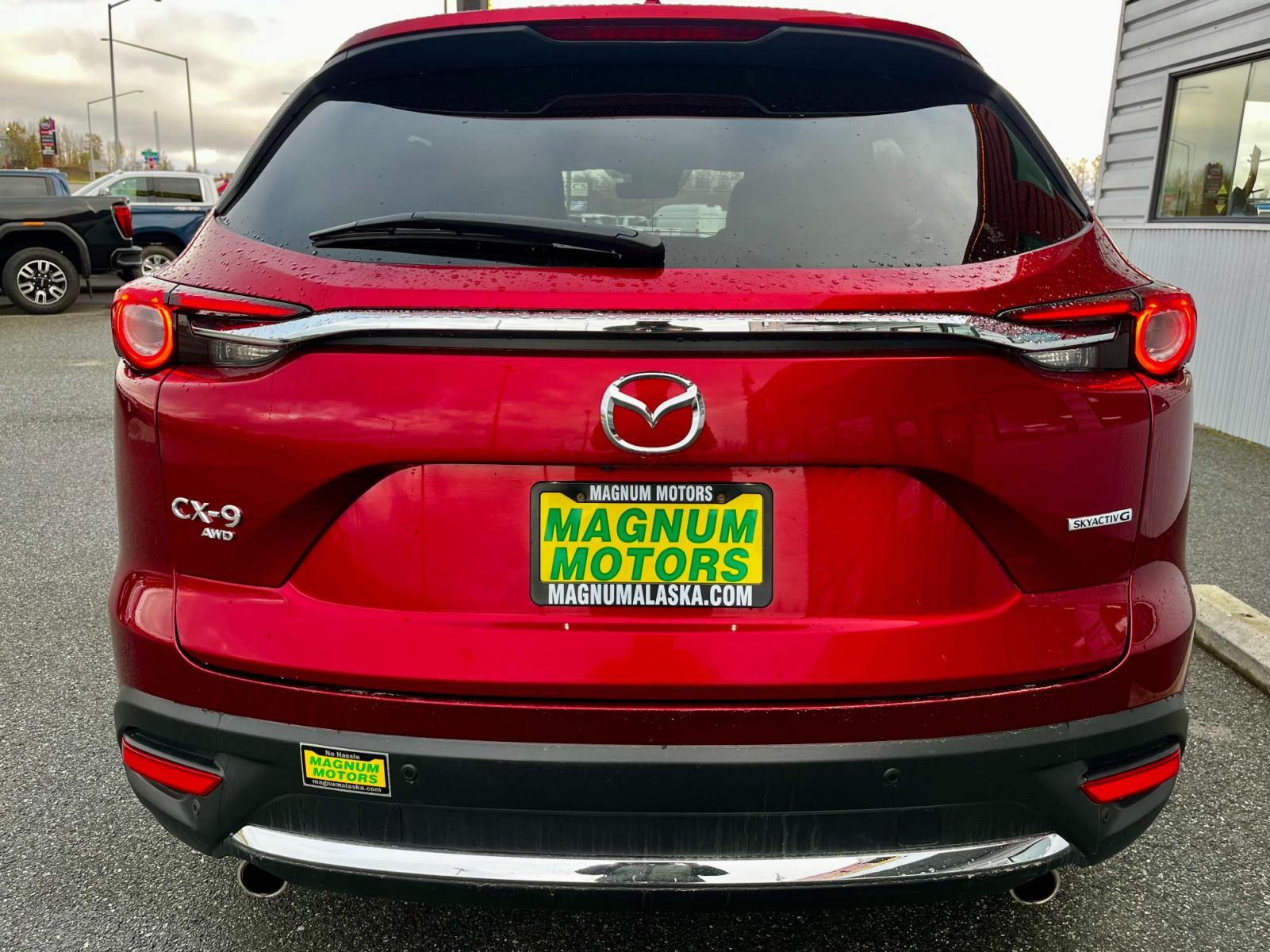 2021 Red /Black Mazda CX-9 Grand Touring AWD (JM3TCBDY7M0) with an 2.5L L4 DOHC 16V engine, 6A transmission, located at 1960 Industrial Drive, Wasilla, 99654, (907) 376-5555, 61.573475, -149.400146 - Photo #4