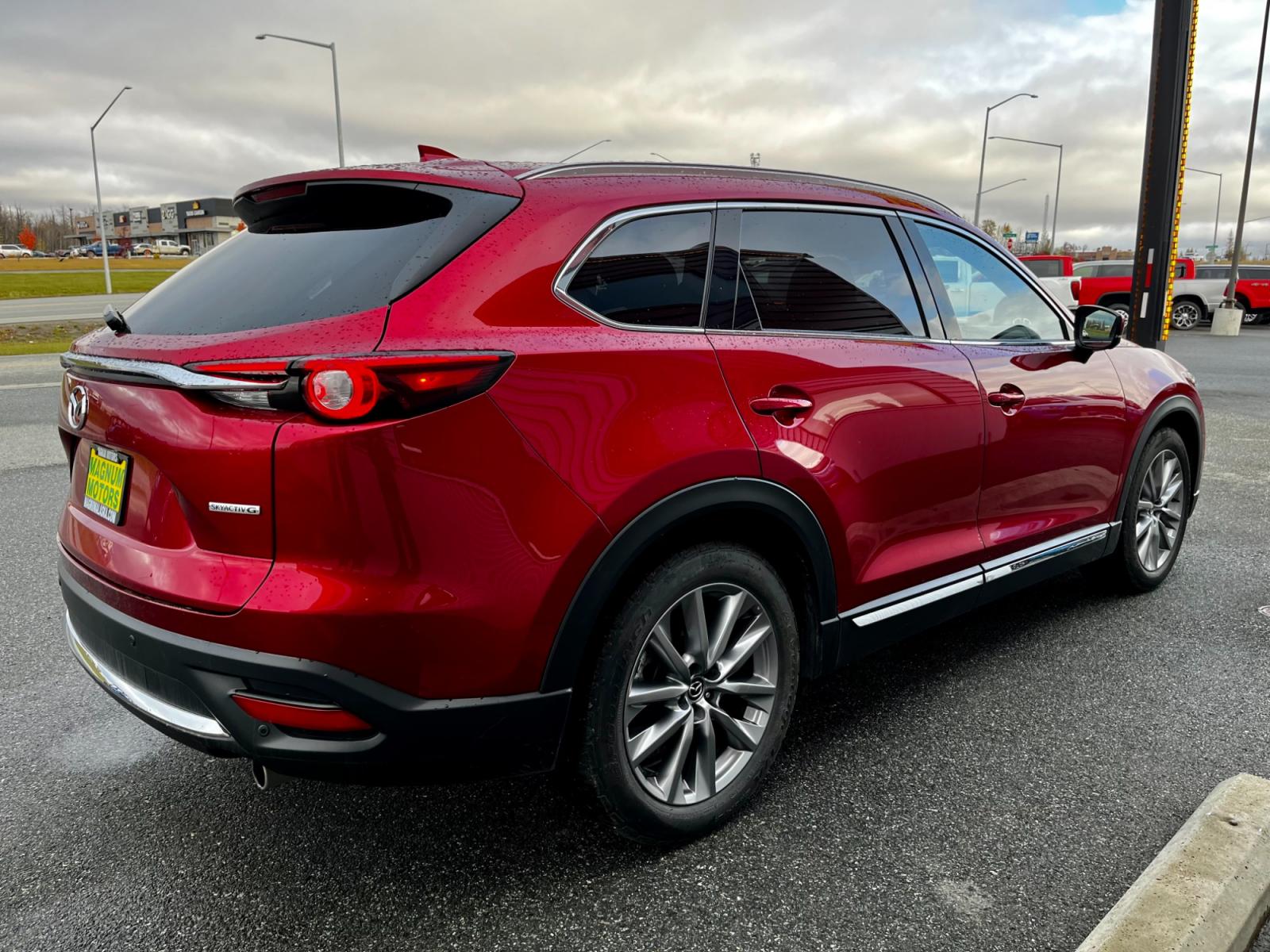 2021 Red /Black Mazda CX-9 Grand Touring AWD (JM3TCBDY7M0) with an 2.5L L4 DOHC 16V engine, 6A transmission, located at 1960 Industrial Drive, Wasilla, 99654, (907) 376-5555, 61.573475, -149.400146 - Photo #7