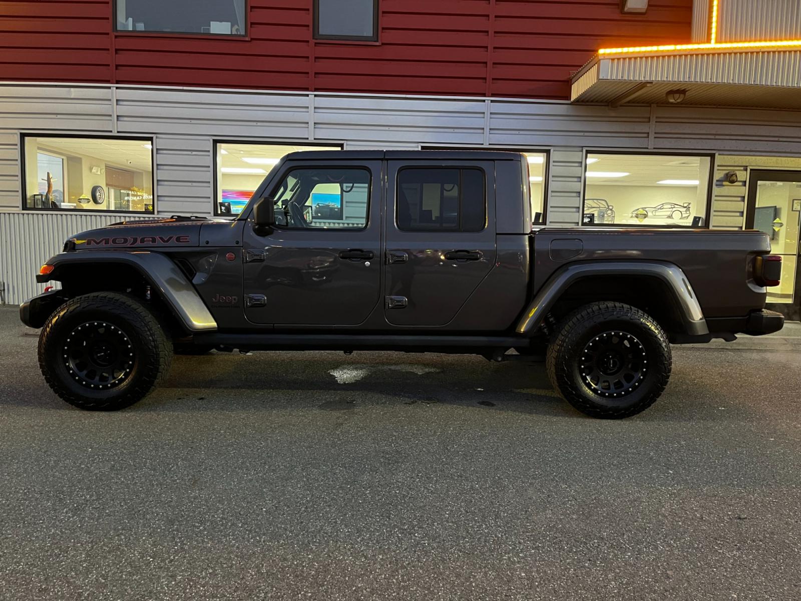 2021 Gray /Black Jeep Gladiator Mojave (1C6JJTEG5ML) with an 3.6L V6 DOHC 24V engine, Auto transmission, located at 1960 Industrial Drive, Wasilla, 99654, (907) 376-5555, 61.573475, -149.400146 - Photo #2