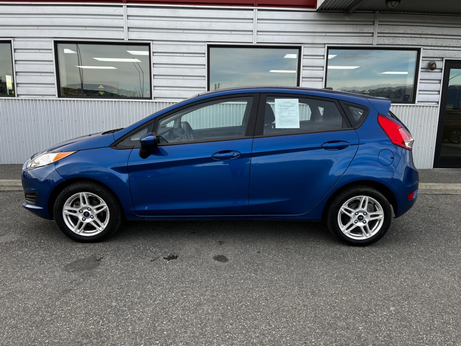 2019 Blue /Black Ford Fiesta SE Hatchback (3FADP4EJ1KM) with an 1.6L L4 DOHC 16V engine, Auto transmission, located at 1960 Industrial Drive, Wasilla, 99654, (907) 376-5555, 61.573475, -149.400146 - Photo #2