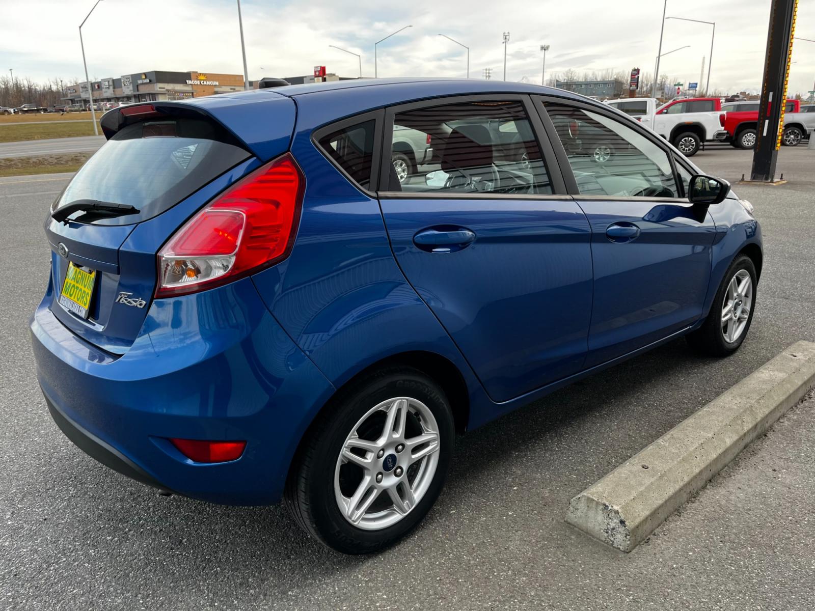 2019 Blue /Black Ford Fiesta SE Hatchback (3FADP4EJ1KM) with an 1.6L L4 DOHC 16V engine, Auto transmission, located at 1960 Industrial Drive, Wasilla, 99654, (907) 376-5555, 61.573475, -149.400146 - Photo #5