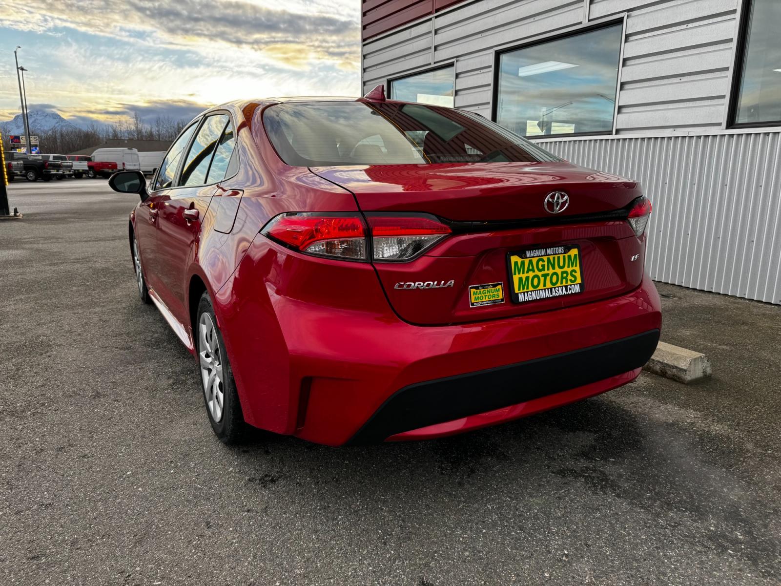 2021 Red Toyota Corolla LE (5YFEPMAE3MP) with an 1.8L L4 DOHC 16V engine, CVT transmission, located at 44152 Sterling Highway, Soldotna, 99669, (907) 262-5555, 60.484917, -151.062408 - Photo #2