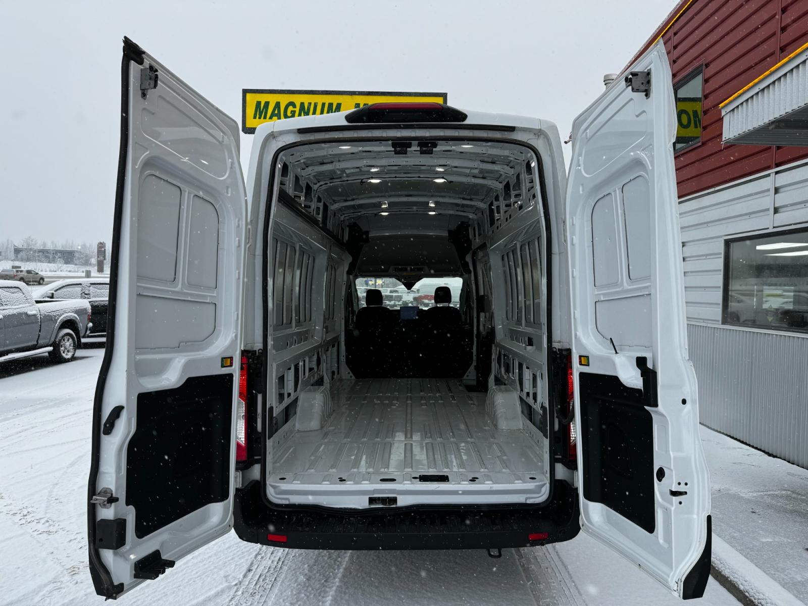2023 White Ford Transit 350 Van High Roof w/Dual Sliding 148-in. WB EL AWD (1FTBW3UG4PK) with an 3.5L V6 DOHC 24V engine, 6A transmission, located at 1960 Industrial Drive, Wasilla, 99654, (907) 376-5555, 61.573475, -149.400146 - Photo #9