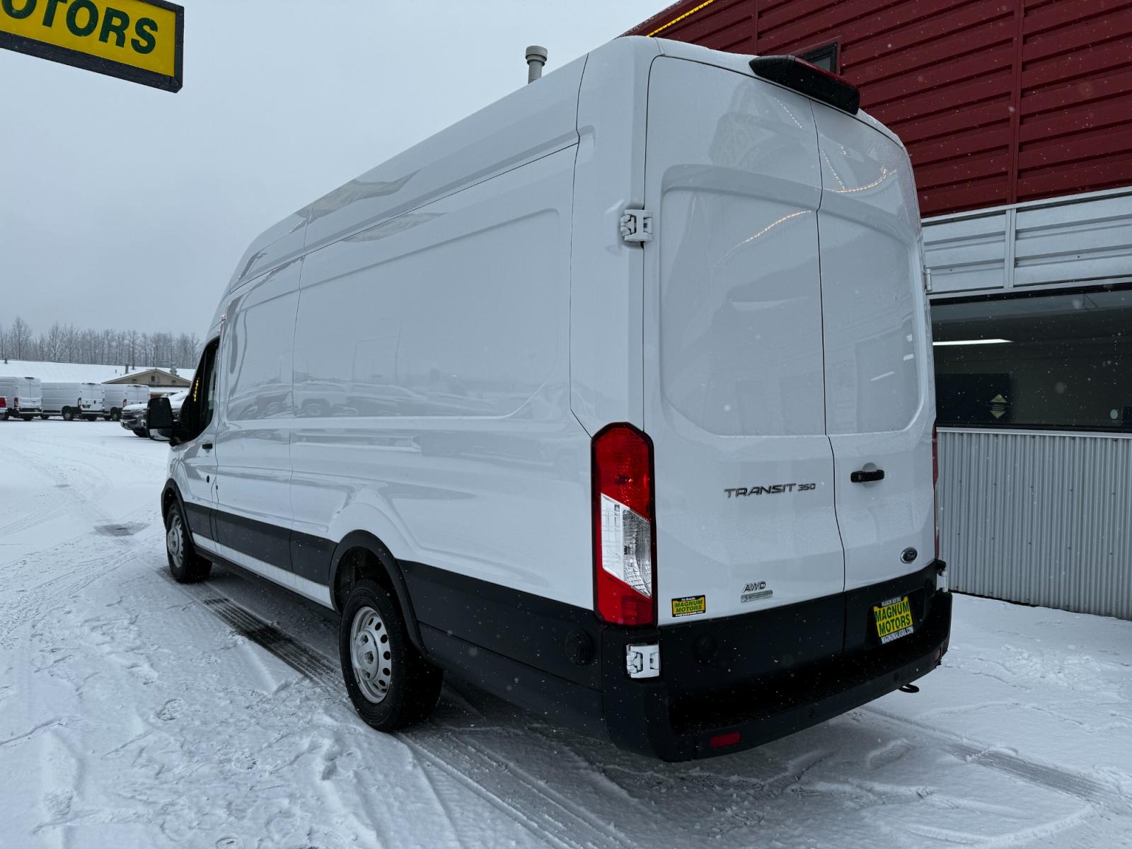 2023 White Ford Transit 350 Van High Roof w/Dual Sliding 148-in. WB EL AWD (1FTBW3UG4PK) with an 3.5L V6 DOHC 24V engine, 6A transmission, located at 1960 Industrial Drive, Wasilla, 99654, (907) 376-5555, 61.573475, -149.400146 - Photo #2