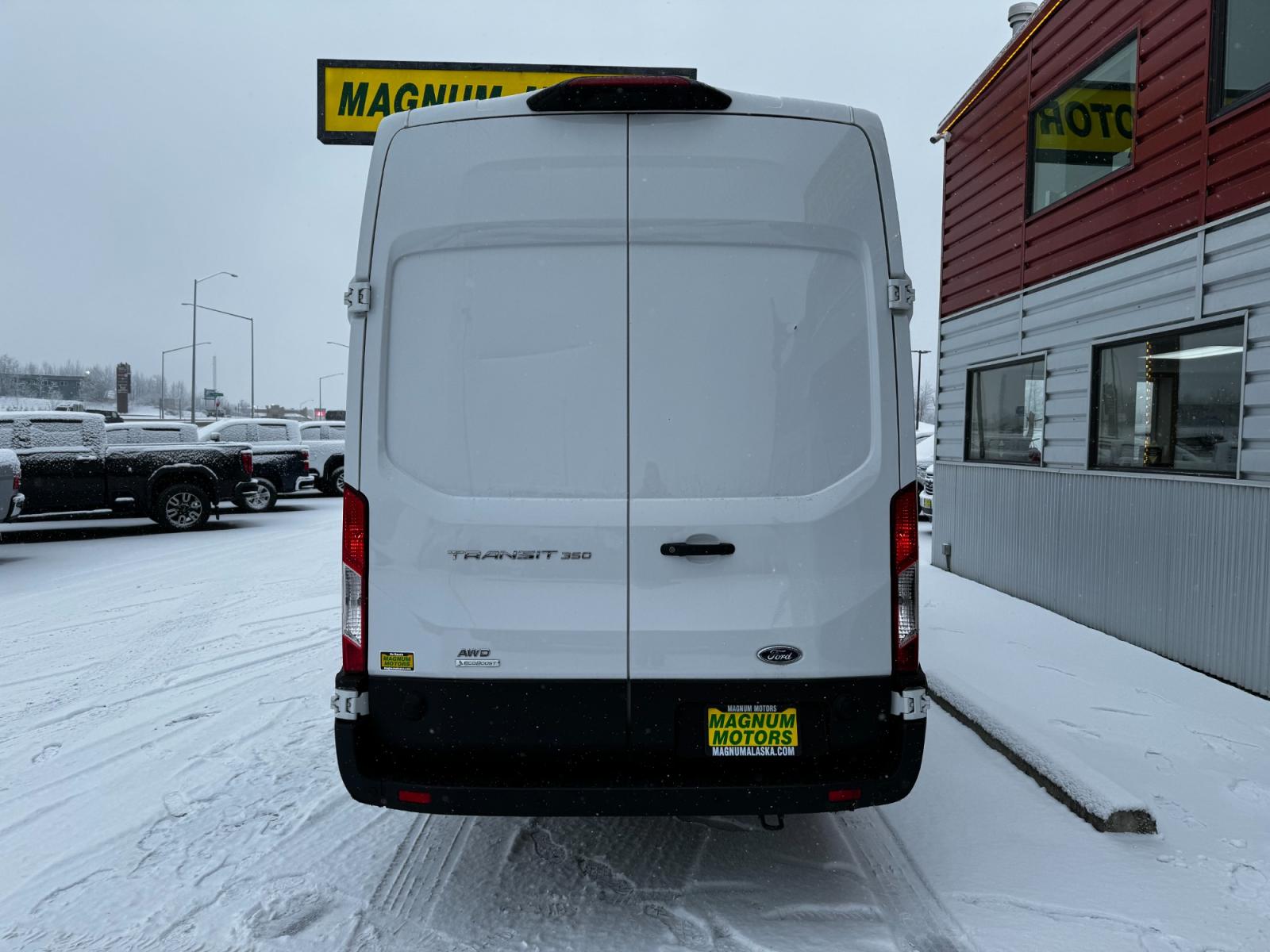 2023 White Ford Transit 350 Van High Roof w/Dual Sliding 148-in. WB EL AWD (1FTBW3UG4PK) with an 3.5L V6 DOHC 24V engine, 6A transmission, located at 1960 Industrial Drive, Wasilla, 99654, (907) 376-5555, 61.573475, -149.400146 - Photo #3